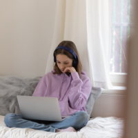 girl in room with laptop