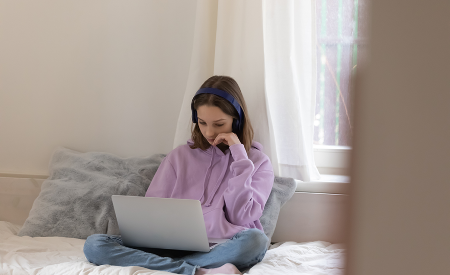 girl in room with laptop
