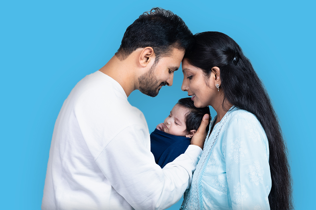 Couple holding baby