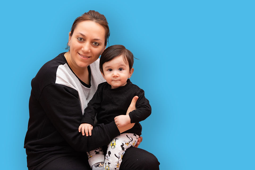 mum with toddler on knee
