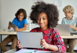 Teenager using a digital tablet