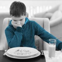 Boy refusing food