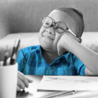 Smiling young boy with Intellectual Disability