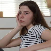 DBTA adolescent girl staring into the distance