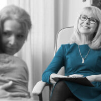 Therapist with happy family