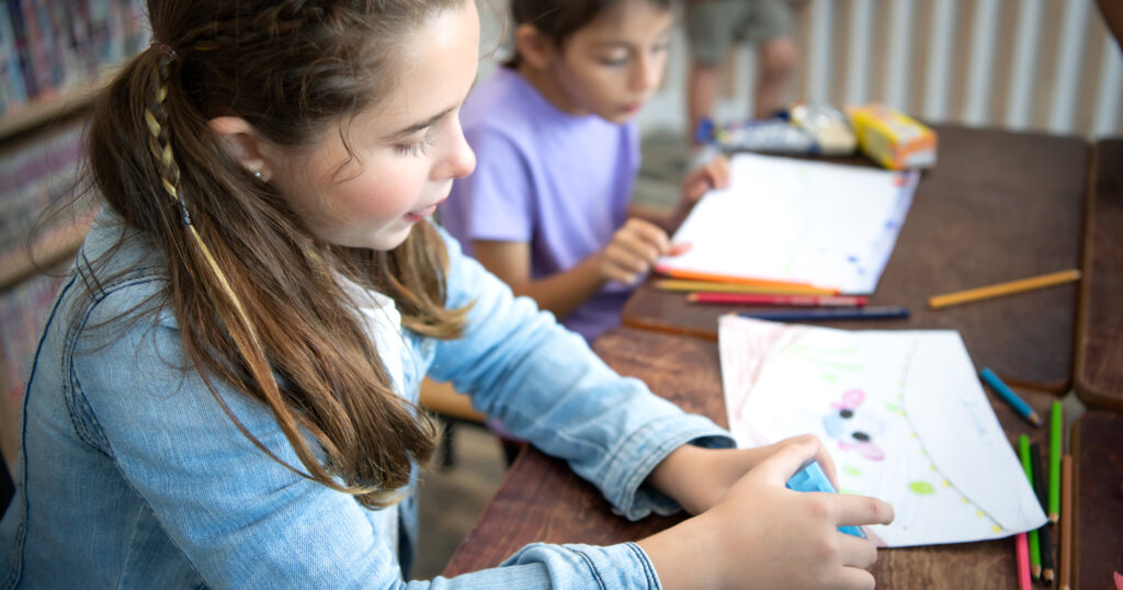 A group of students from an international school that promotes creativity and places children at the center of learning in a variety of subjects.