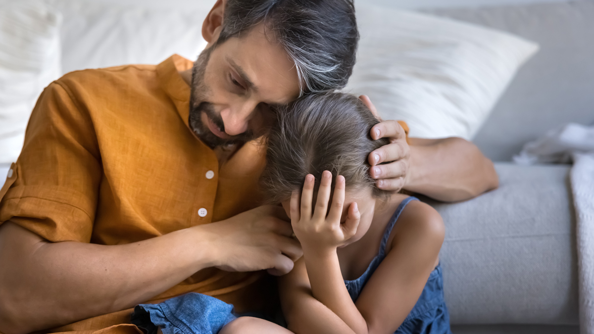 Grieving suffering dad hug upset depressed tween daughter crying on floor at home offer support comfort in difficult moment of losing beloved person coping with parents divorce separation. Grieving suffering dad hug upset depressed tween daughter crying on floor at home offer support comfort in difficult moment of losing beloved person coping with parents divorce separation.
