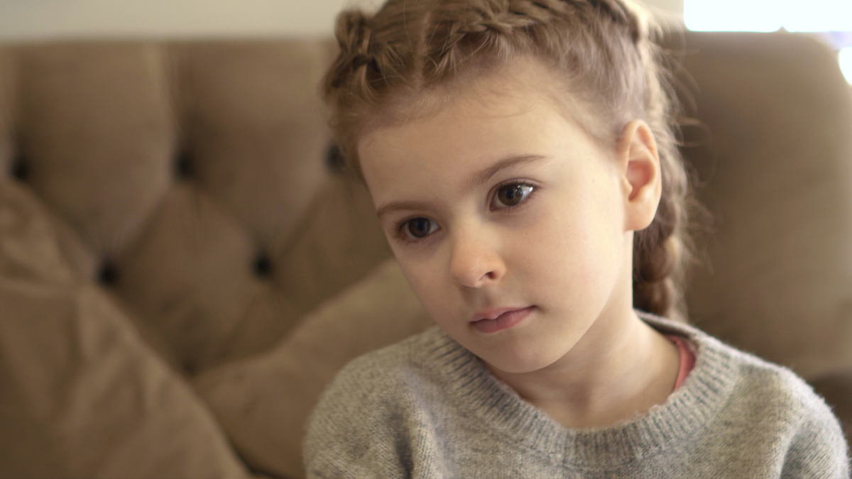 Portrait of little girl aged 5. Moody and confused girl. Mistreated child. Portrait of little girl aged . Moody and confused girl. Mistreated child.