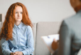 teen girl talking to psychologist