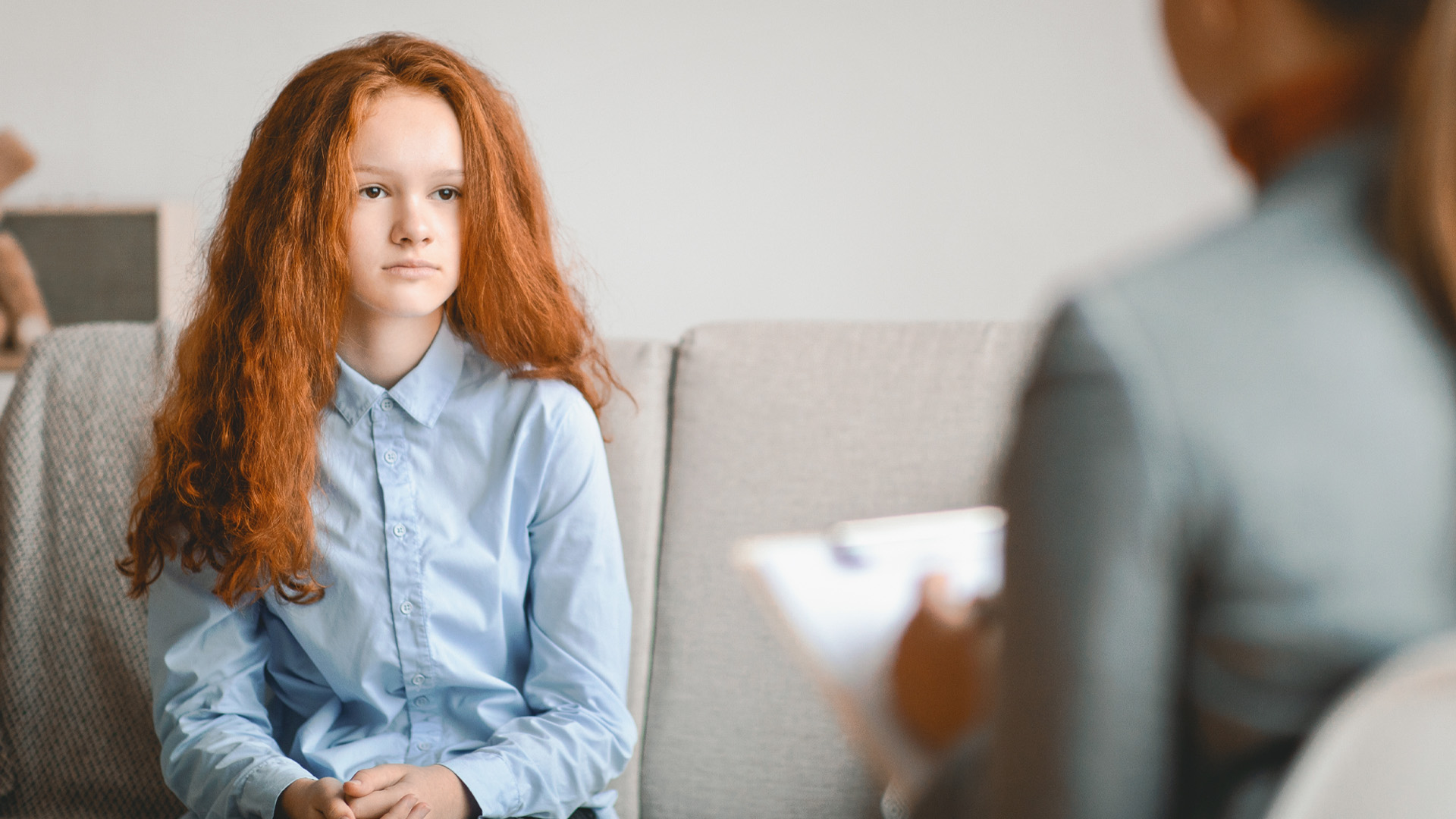 teen girl talking to psychologist